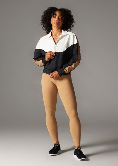 Elevation Colorblock Half Zip | Tops > Jackets | Tavi – Tavi Active